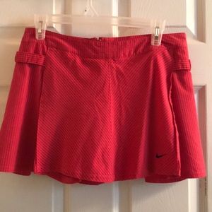 Nike size 4 pleated skirt with built in shirts.